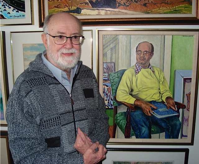 Professor Edwin Procunier, pictured with a portrait of himself by artist Clark MacDougall